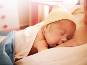 Should You Let Your Baby Sleep on Your Chest?