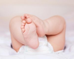 Why Is Your Baby Throwing Legs Up and Down in Sleep?
