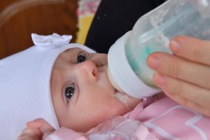 Why Is My Baby Spitting Out Milk When Feeding