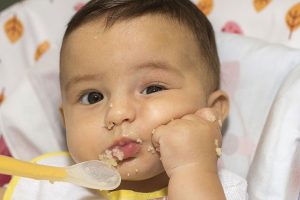 Child humming while concentrating
