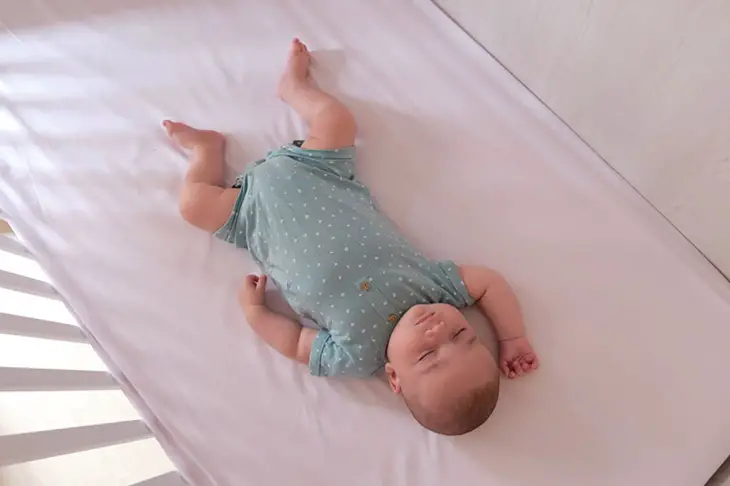 baby turns 180 degrees crib