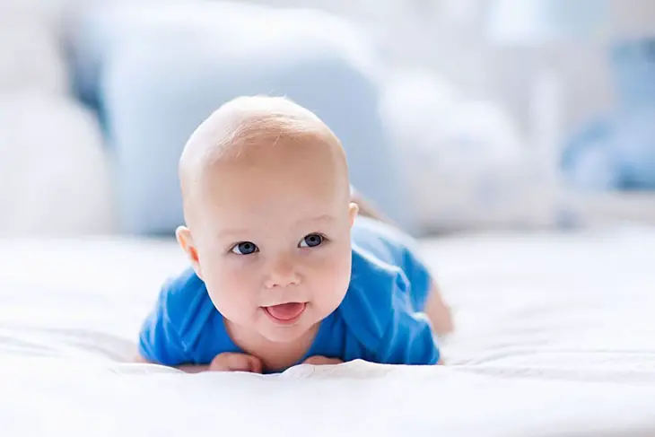 how to get baby to use arms during tummy time