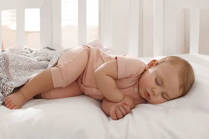 infant making noises while sleeping