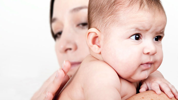 why is my baby spitting up curdled milk